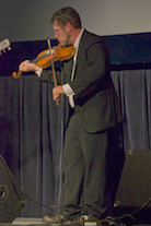 Ashley MacIsaac on fiddle