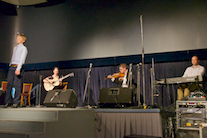 Iain MacQuarrie step dancing to the music of Ashley MacIsaac on fiddle, Kolten Macdonell on keyboard, and Mary Beth Carty on guitar