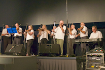 The Feisty Fiddlers directed by Eddie Rogers and accompanied by Danny Rogers on keyboard