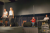 Janelle and Lauren Boudreau step dancing to the music of Mike Barron on fiddle and Kolten Macdonell on keyboard