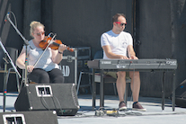 Dara Smith-MacDonald on fiddle accompanied by Kolten Macdonell on keyboard