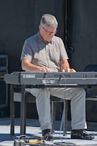 Lawrence Cameron playing a solo on keyboard