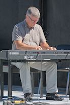 Lawrence Cameron playing a solo on keyboard