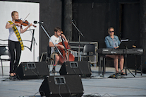 Rachel Campbell on fiddle accompanied by Noel Campbell on cello and Gabrielle Campbell on keyboard