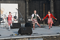 Amelie Bates, Mia Nordine, and Emma MacNeil dancing the Seann Triubhas to recorded music