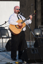 JP MacNeil singing The Water is Wide to his own guitar accompaniment