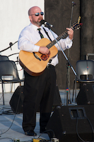 JP MacNeil singing The Water is Wide to his own guitar accompaniment