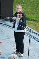 Dara Smith-MacDonald directing and on fiddle