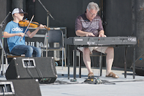 Iain MacQuarrie on fiddle accompanied by Howie MacDonald on keyboard