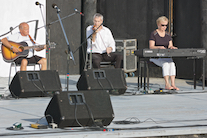 Kinnon Beaton on fiddle accompanied by Betty Lou Beaton on keyboard and Terry McNamara on guitar