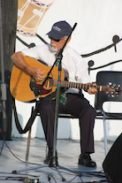 Denis Larade on guitar