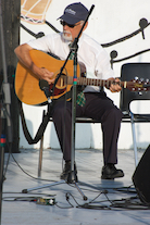 Denis Larade on guitar