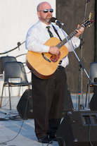 JP MacNeil singing The Water is Wide to his own guitar accompaniment