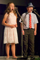 Ava and Thomas Paufler singing a cappella