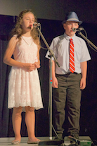 Ava and Thomas Paufler singing a cappella