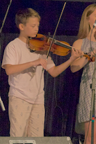 John Angus MacNeil on fiddle