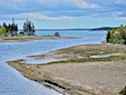 Homeville River enters Mira Bay