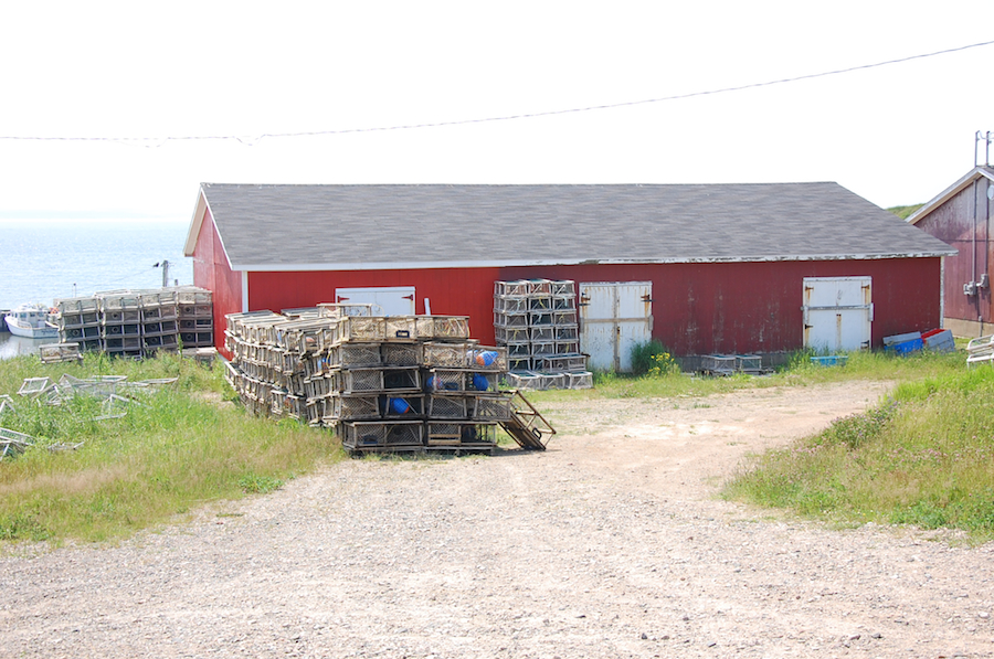 Stacked traps beside the storage barn at le Havre-de-la-Pointe